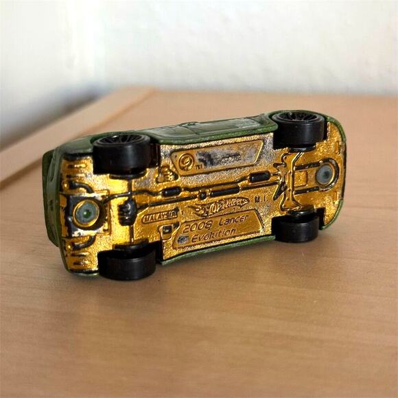 Y2K Hot Wheels 2008 Mitsubishi Lancer Evolution Diecast Car Green 1:64 Gold Base - Picture 6 of 6